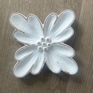 Off white wooden flower